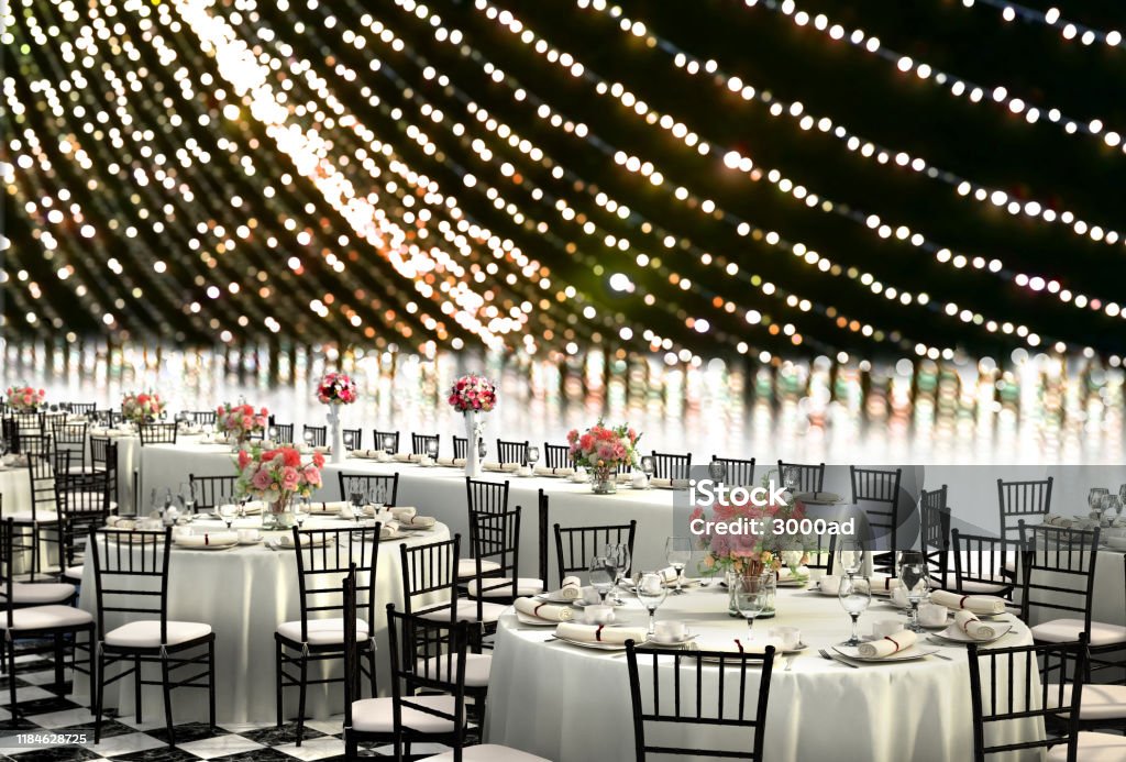 3D Illustration of a wedding reception venue decorated in white with ten seat round tables and a head table on a bokeh background